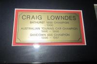 CRAIG LOWNDES: A large signed photograph featuring Lowndes in his Mobile 1 Commodore - 6
