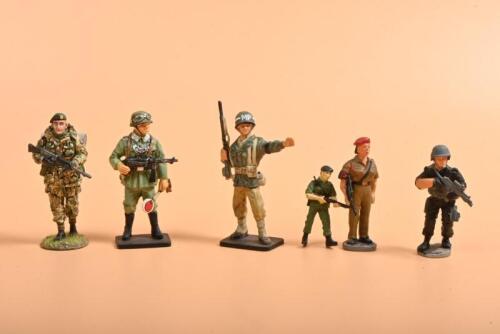 MILITARY: A group of all metal Military figures. KING & COUNTRY "FALKLANDS WAR" TF001 BRITISH COMMANDO FLAG BEARER & two Military Police figures by del Prado