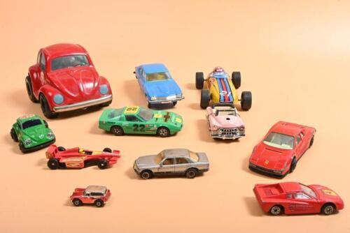 ASSORTED DIECAST/TOYS: A eclectic collection of diecast vehicles and toy like models. Tin & diecast models. Bburago Chevrolet Corvette & Ford Capri models