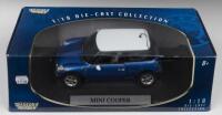 MINI COOPER: A 1:18 scale MOTOR MAX MINI COOPER in metallic blue