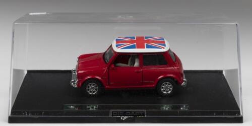 MINI COOPER: A New Ray 1:43 scale Mini Cooper in red. Union Jack to white roof