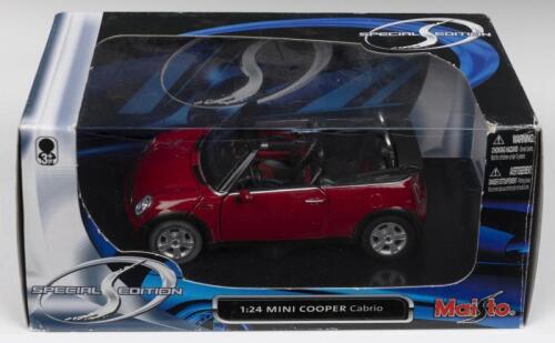 COOPER CABRIO: A Special Edition Maisto 1:24 scale MINI COOPER Cabrio. Red