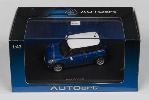 MINI COOPER: An AUTOART 1:43 scale 2006 Mini Cooper in lightning blue metallic/white roof