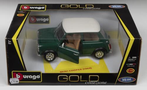 MINI COOPER: A Bburago 1:18 scale MINI COOPER (1969). Green body, white roof