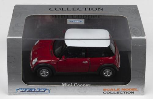 COOPER: A WELLY 1:36 scale Mini Cooper. Red