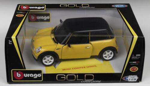 MINI COOPER: A Bburago 1:18 scale 2001 Mini Cooper in yellow