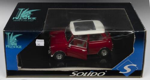MINI: A SOLIDO 1:18 scale Mini. Red with white roof
