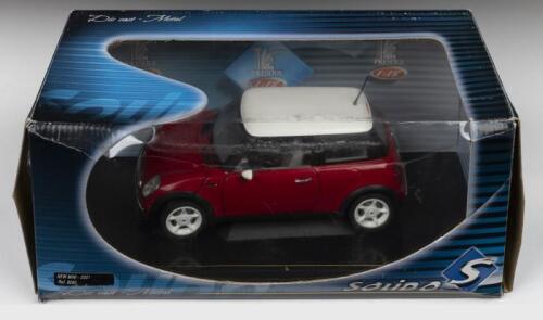 MINI: A SOLIDO 1:18 scale Mini. Red with white roof