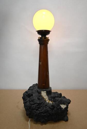 LIGHTHOUSE LAMP: A vintage carved lamp in the of a lighthouse, the turned stem sitting on a burl wood base with Bakelite fittings and a smoked translucent shade, fitted for electricity, 70cm high (UPDATED PHOTOS)
