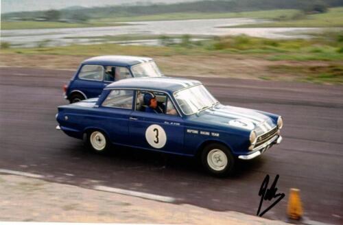 NEPTUNE RACE TEAM: A hand signed colour photograph featuring teammates Peter Manton and Jim McKeown dicing, signed in black marker lower right