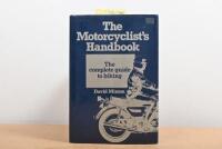 MOTORCYCLES: A 1981 edition of 'The Motorcyclist's Handbook' hardcover book by David Minton, published by Pan Books Ltd, 239 pages; with numerous motor cycling racers signatures including Giacomo Agostini, Stuart Graham, Phil Read, John Surtees.