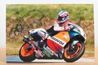 MICK DOOHAN: A colour picture of Mick Doohan on Repsol Honda #1 at Phillip Island. Autographed by Mick Doohan