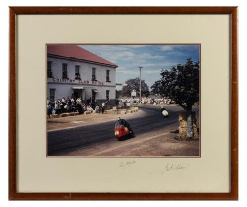 LONGFORD: A framed and glazed photographic print by Keith Ward, Longford March 1960 depicting Eric Hinton leading Jack Ahearn around the Country Club Hotel, mounting board autographed by both riders