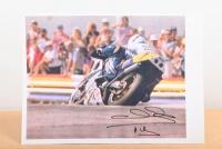 WAYNE GARDNER: A colour picture of Wayne Gardner on Rothman's #1 Honda. Autographed by Wayne Gardner