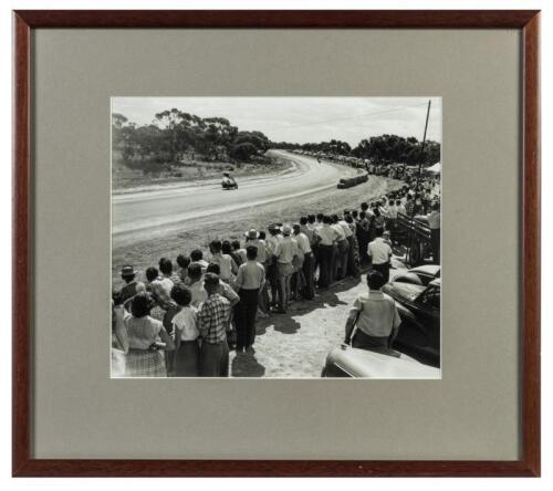 KEITH CAMPBELL: A framed and glazed photographic print depicting Keith Campbell on a streamlined Norton 500, December 26, at the 1955 Victorian Grand Prix Mildura. Photograph on glass negative by the late Ted Lawton.