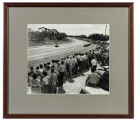 KEITH CAMPBELL: A framed and glazed photographic print depicting Keith Campbell on a streamlined Norton 500, December 26, at the 1955 Victorian Grand Prix Mildura. Photograph on glass negative by the late Ted Lawton.