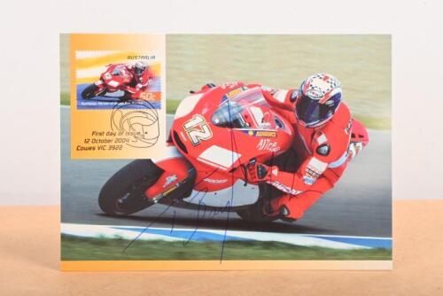 TROY BAYLISS: A postcard featuring Troy Bayliss on #12 Ducati. Autographed by Troy Bayliss