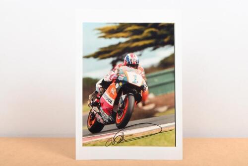 MICK DOOHAN: A colour picture of Mick Doohan on Repsol Honda #1. Autographed by Mick Doohan