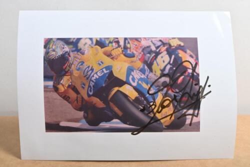 MAX BIAGGI: A colour picture of Max Biaggi on #3 Honda in the Pacific GP 2003. Autographed by Max Biaggi