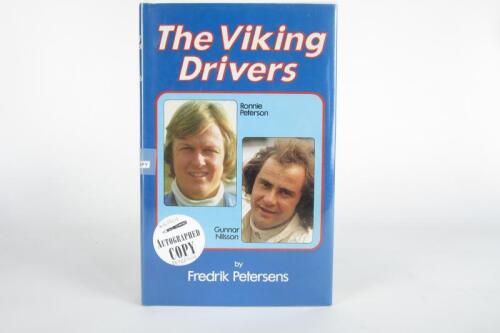 NILSSON/PETERSON: 'The Viking Drivers' hardcover book by Fredrik Petersens. With attached Gunnar Nilsson/Ronnie Peterson signatures