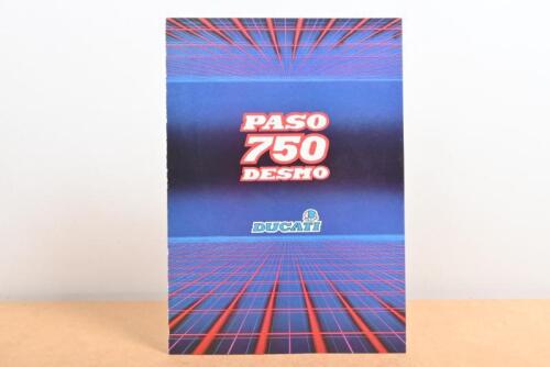 DUCATI 750: A colour fold out Ducati 750 Paso Desmo 1986 sales brochure, folds out into two A4 sized sections with large colour images inside and technical data and specifications on the rear page.