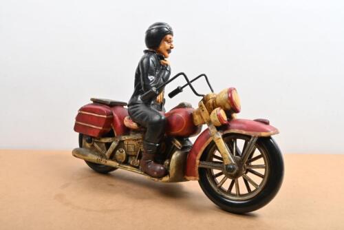 MOTORCYCLING: A decorative composite model of a motorcyclist and motorcycle, 46cm long