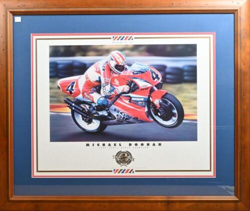 MICK DOOHAN: A limited edition print '1994 500cc World Championship' illustrated by Tony Stewart. Framed and glazed