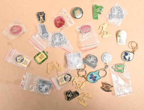 BADGES: A large collection of competitors and event badges and keyrings, largest 3.5 x 4cm