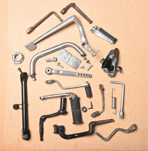 PARTS: A collection of various foot operated parts, including footrests, pedals etc