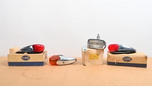 HELLA: Four Hella lamps, two in box with red lenses, one with amber lens and one clear with mounting bracket