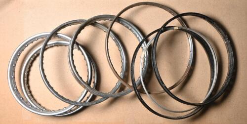 WHEELS: Four single lace metal rims 57cm overall, together with four chromed two lace rims 51cm overall