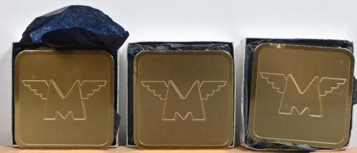 MATCHLESS: Three sets of six Matchless gilt metal drinks coasters with winged M logo