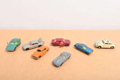 DIECAST CARS: A group of seven 1:64 scale diecast cars. Jaguar MK 10 by FUN-HO & Husky