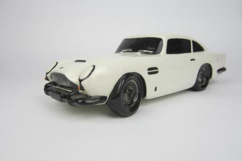 ASTON MARTIN: A rare ceramic Aston Martin DB5 money box.